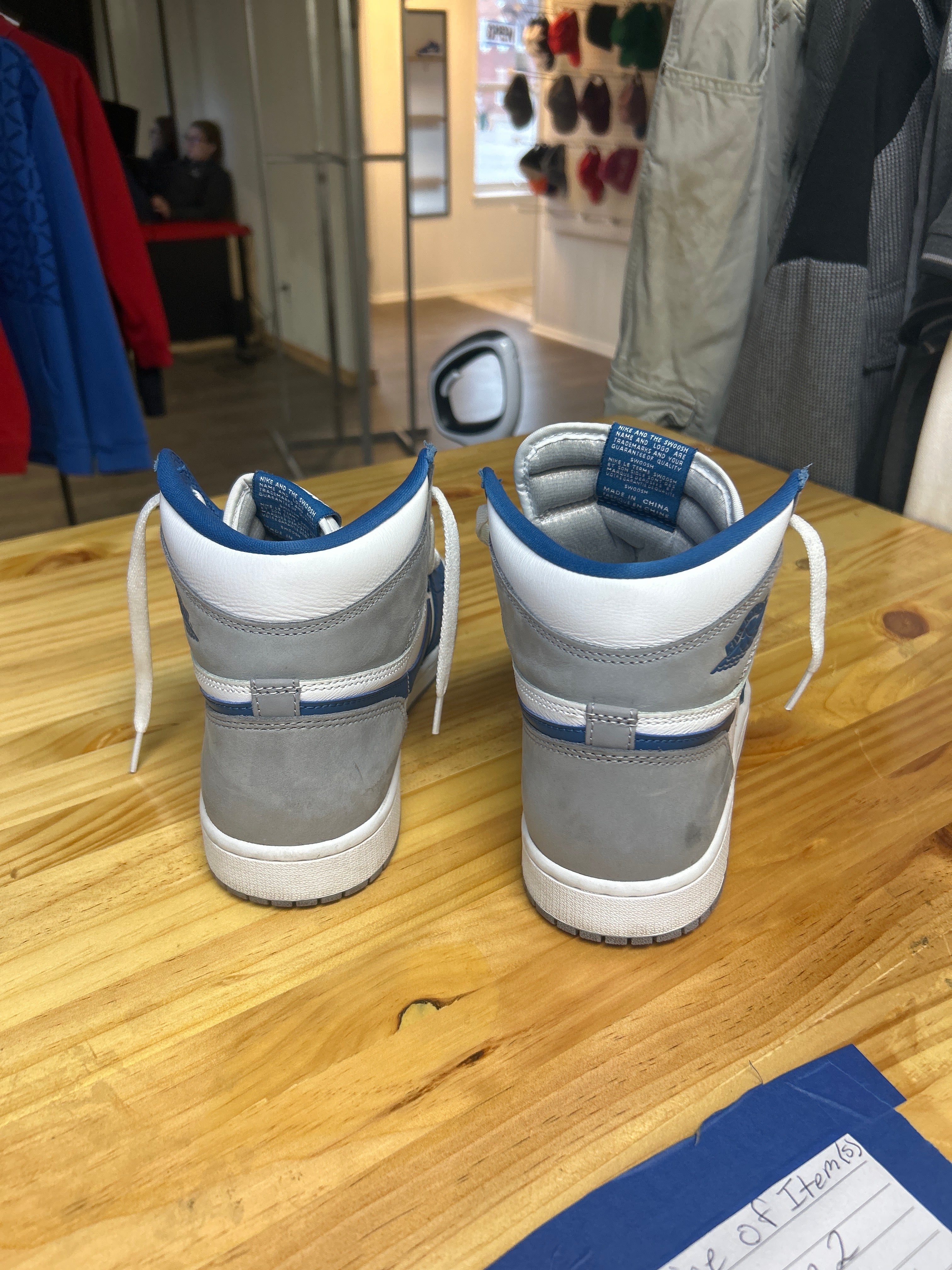 This is a Nike Air Jordan 1 Retro High OG "True Blue" sneaker.