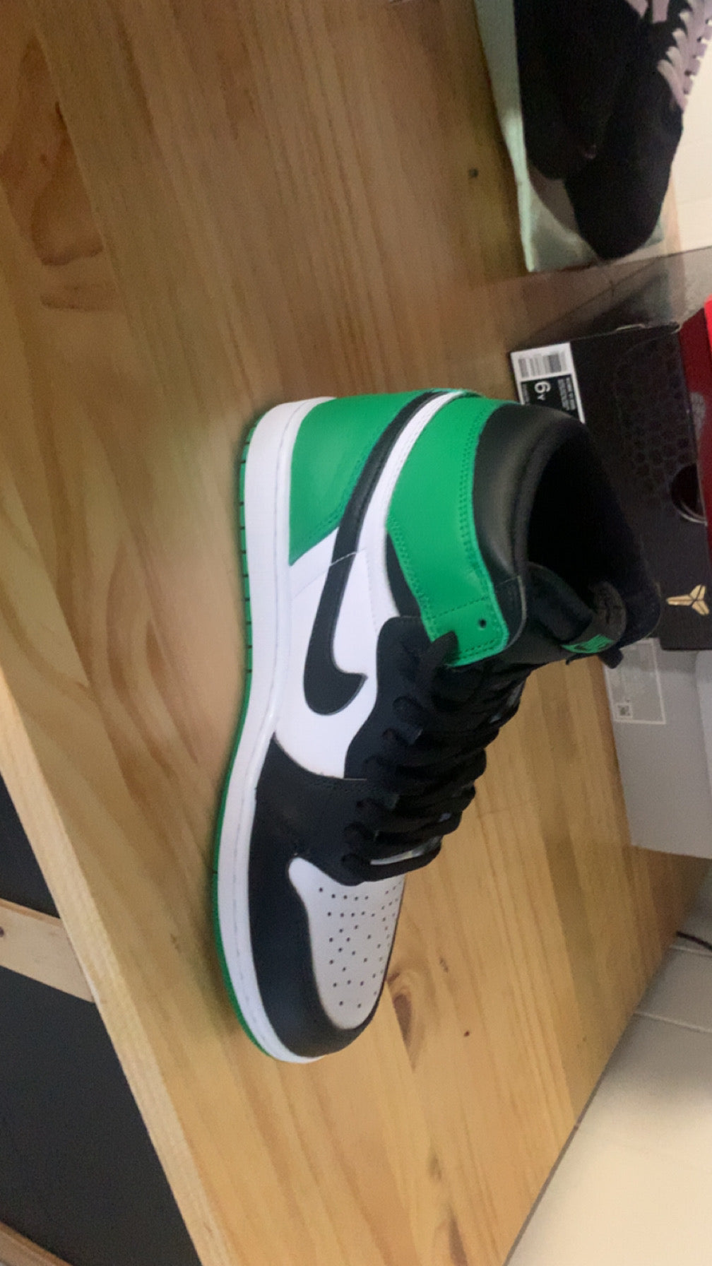 This is a Nike Air Jordan 1 Retro High OG 'Lucky Green'
