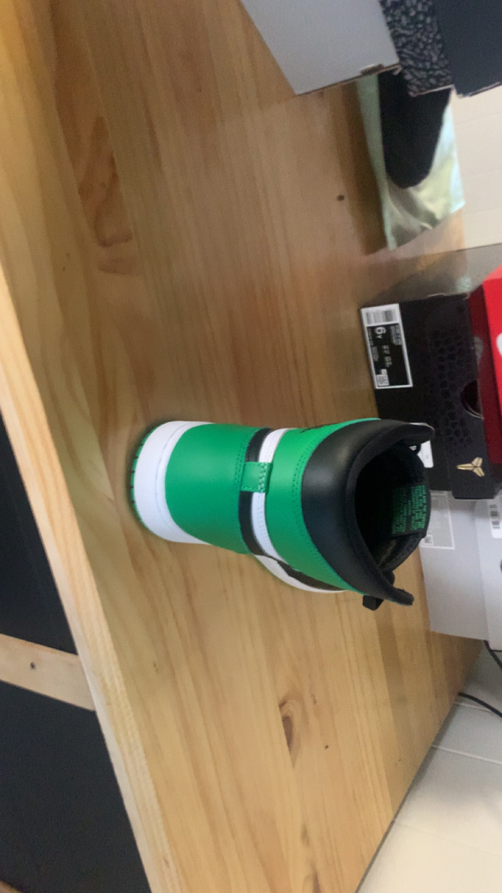 This is a Nike Air Jordan 1 Retro High OG 'Lucky Green'