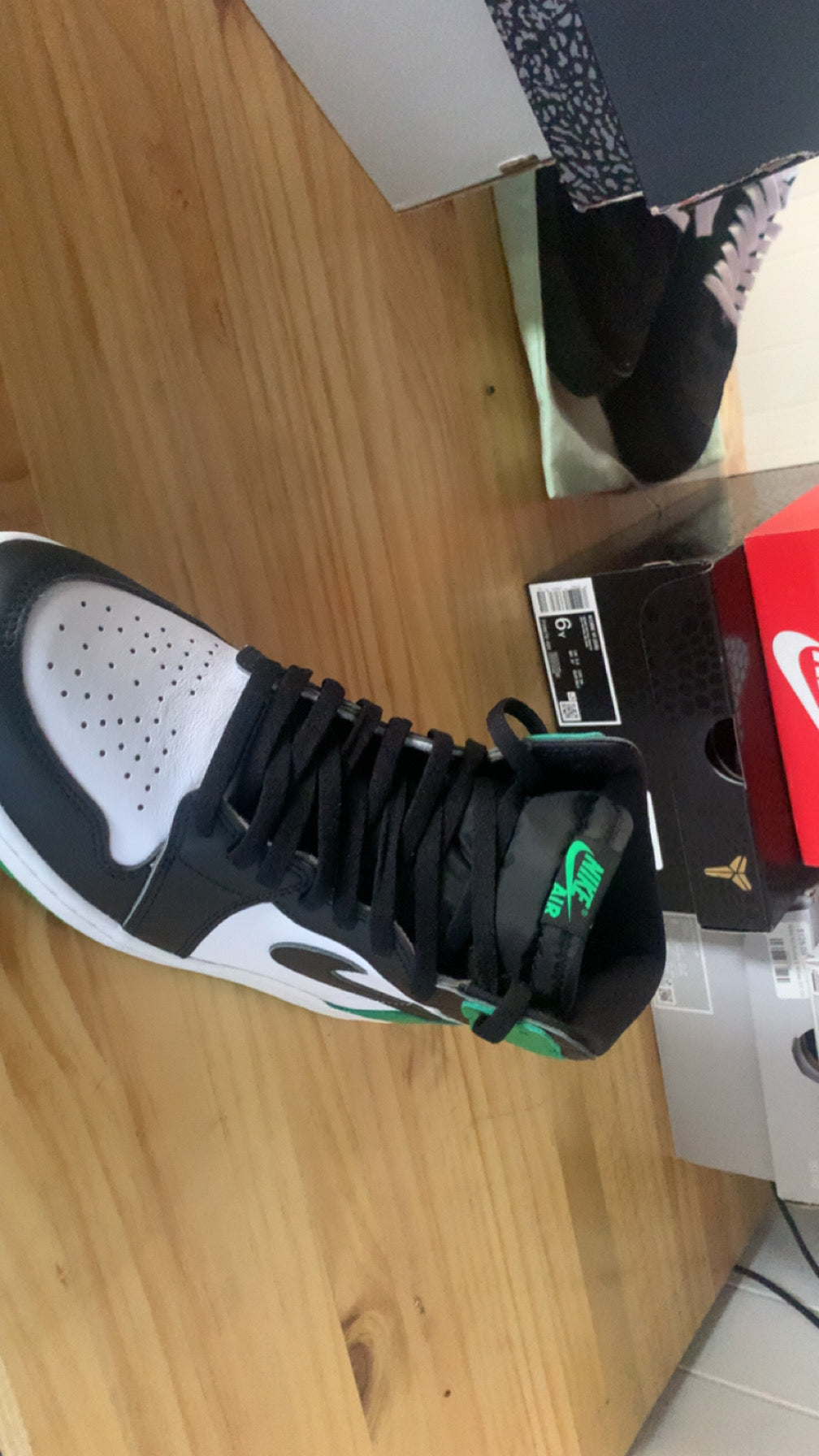 This is a Nike Air Jordan 1 Retro High OG 'Lucky Green'